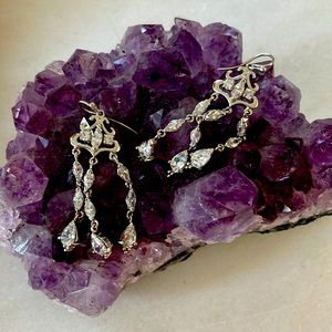 Silver and CZ dangling earrings.